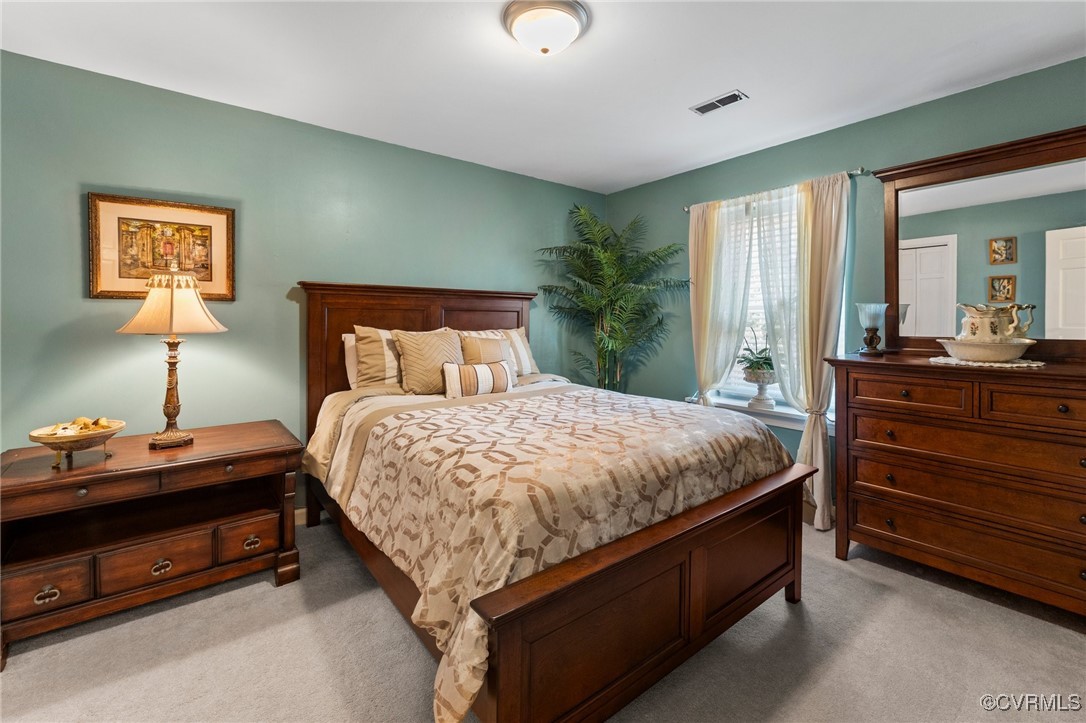 200 St Georges Boulevard Williamsburg, VA 23185 - Photo 26 of 49 Bedroom with visible vents and light colored carpe