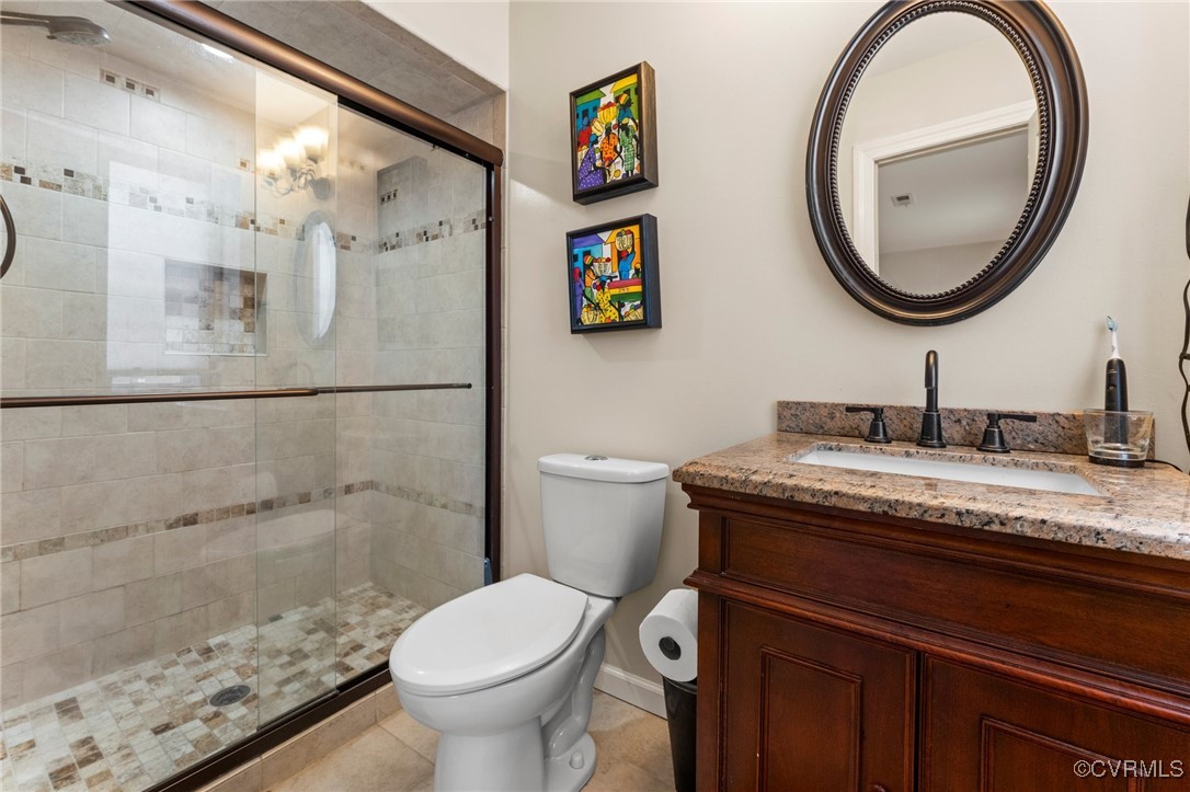 200 St Georges Boulevard Williamsburg, VA 23185 - Photo 32 of 49 Bathroom with tile patterned floors, a stall showe
