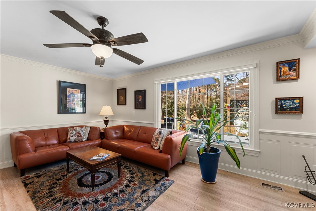 200 St Georges Boulevard Williamsburg, VA 23185 - Photo 4 of 49 Living area featuring visible vents, ornamental mo