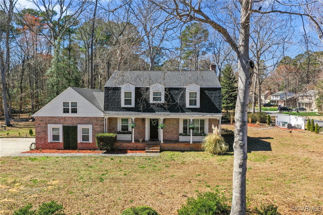 200 St Georges Boulevard Williamsburg, VA 23185 - Photo 49 of 49 View of front facade with a front lawn, covered po