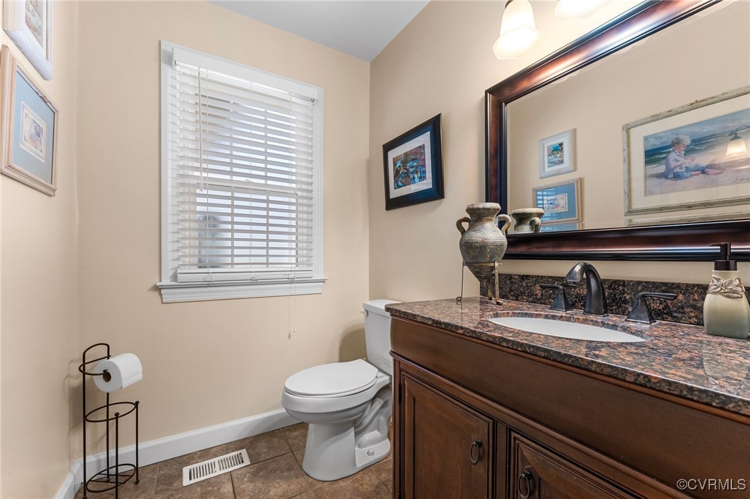 200 St Georges Boulevard Williamsburg, VA 23185 - Photo 5 of 49 Half bathroom with tile patterned floors, visible