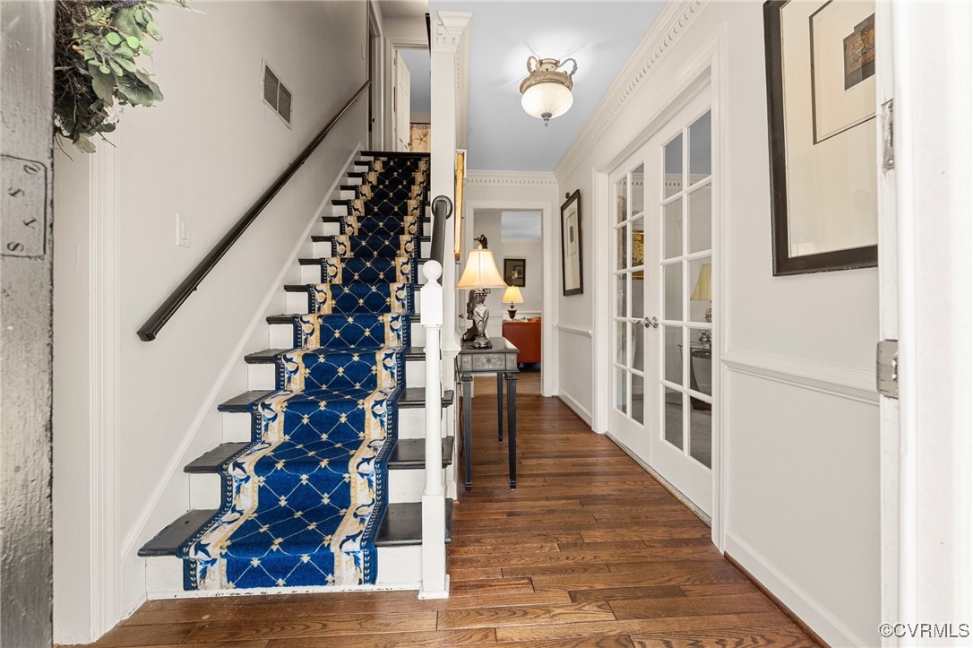200 St Georges Boulevard Williamsburg, VA 23185 - Photo 6 of 49 Foyer with stairway, wood finished floors, visible