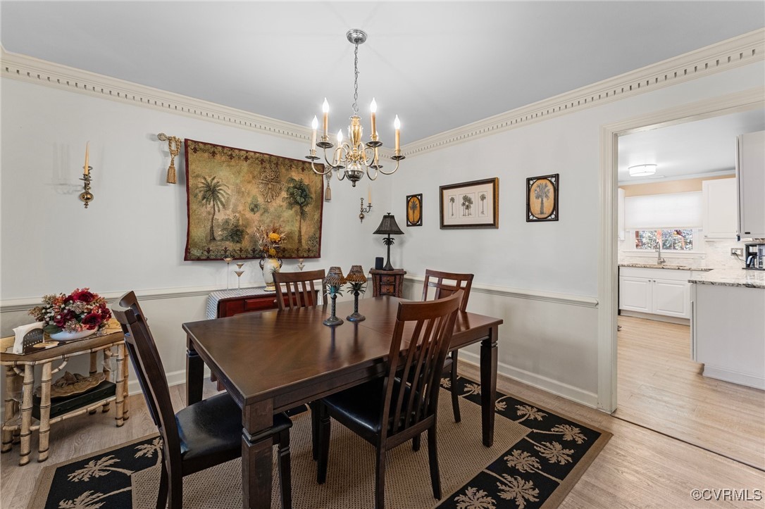 200 St Georges Boulevard Williamsburg, VA 23185 - Photo 7 of 49 Dining space with crown molding, light wood-style
