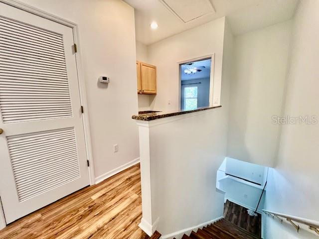 15609 Stable Run Drive Spring Hill, FL 34610 - Photo 16 of 37 a view of hallway with wooden floor