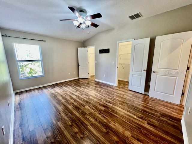 15609 Stable Run Drive Spring Hill, FL 34610 - Photo 19 of 37 wooden floor in an empty room with a window