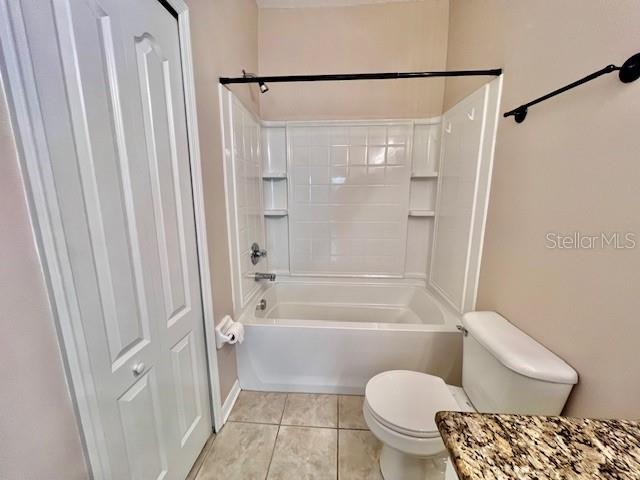 15609 Stable Run Drive Spring Hill, FL 34610 - Photo 24 of 37 a bathroom with a toilet and a shower