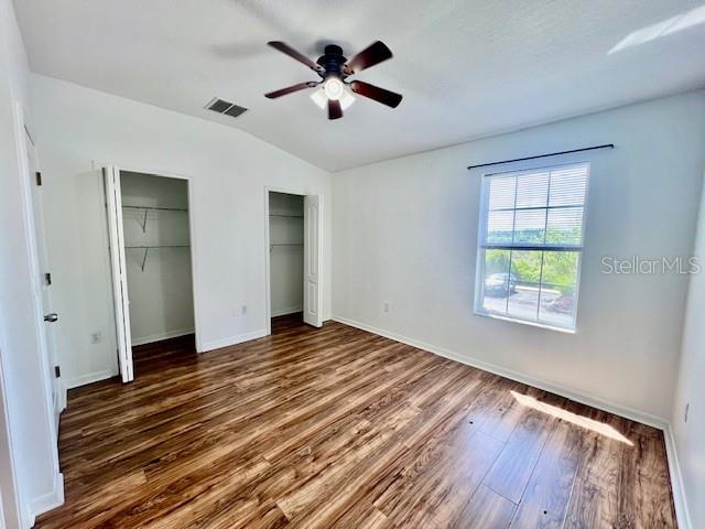 15609 Stable Run Drive Spring Hill, FL 34610 - Photo 26 of 37 wooden floor in an empty room with a window
