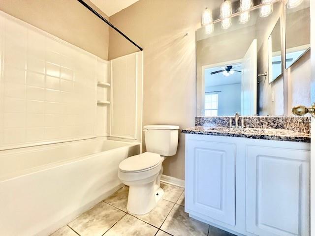 15609 Stable Run Drive Spring Hill, FL 34610 - Photo 28 of 37 a bathroom with a granite countertop sink toilet mirror and a bathtub