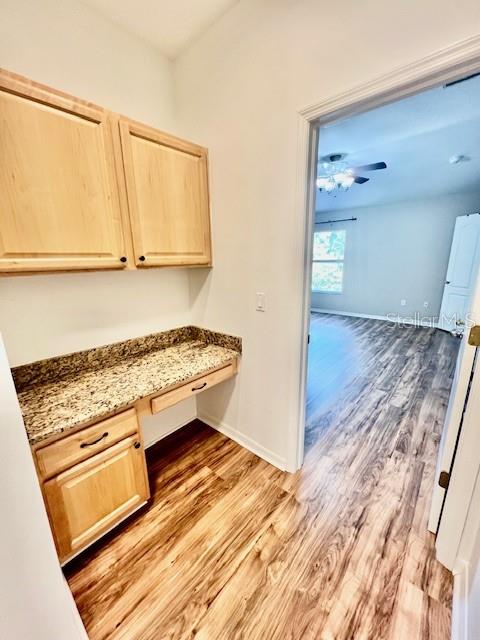 15609 Stable Run Drive Spring Hill, FL 34610 - Photo 30 of 37 a view of kitchen and wooden floor