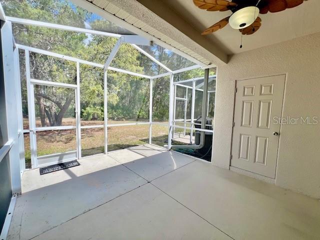 15609 Stable Run Drive Spring Hill, FL 34610 - Photo 34 of 37 a view of a room with gym equipment