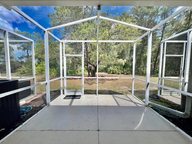 15609 Stable Run Drive Spring Hill, FL 34610 - Photo 35 of 37 a garden view with a sitting space