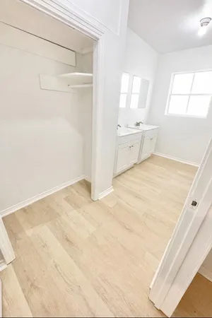 a view of a kitchen with a sink
