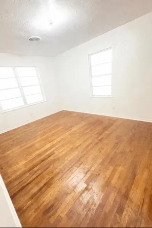 a view of an empty room and window
