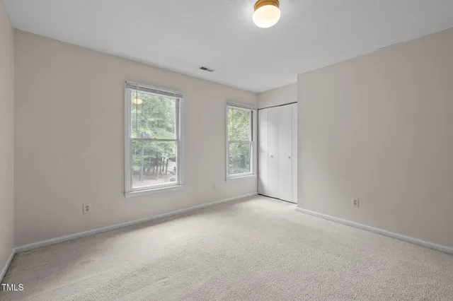 a view of a bathroom with a glass door