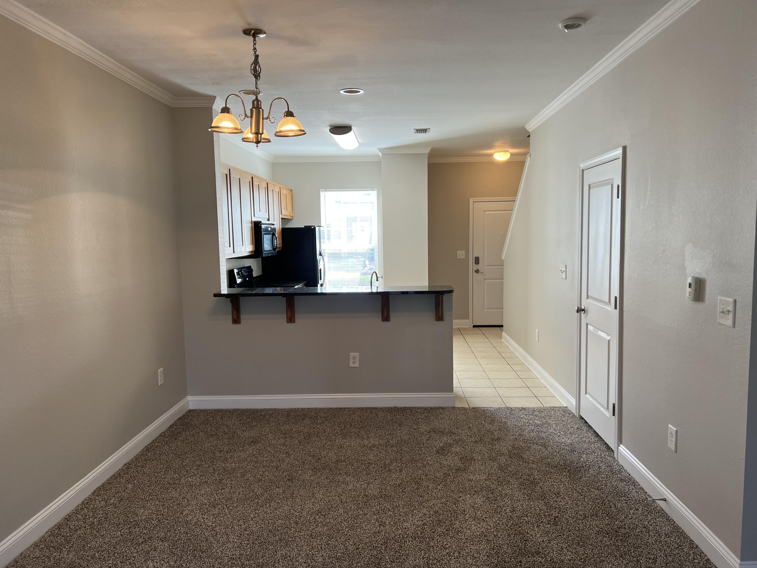 31 North Sand Palm Road Freeport, FL 32439 - Photo 13 of 23 a view of a kitchen with a sink and a window