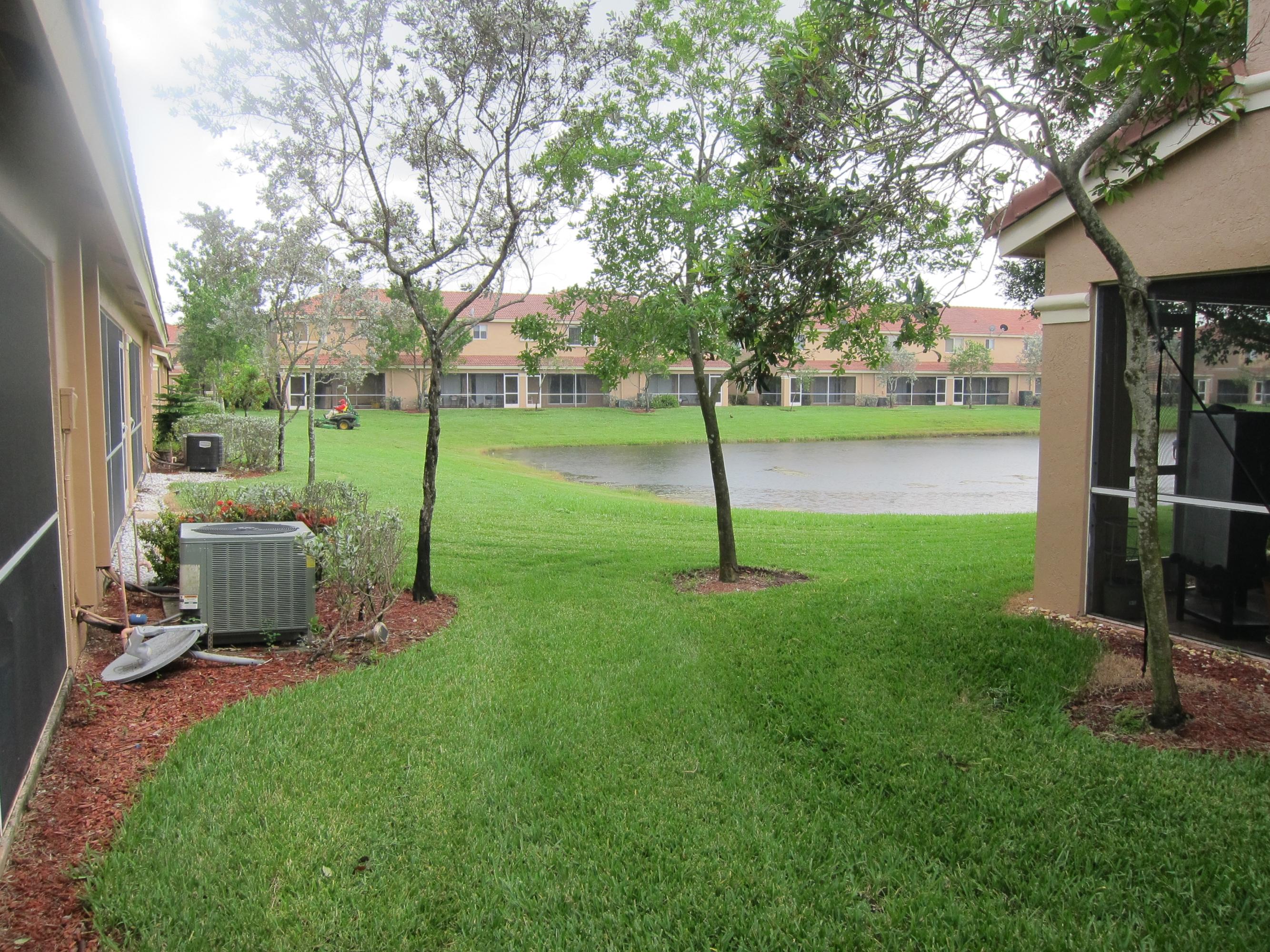 5509 Crossing Rocks Court Riviera Beach, FL 33407 - Photo 17 of 17 view of water from back yard