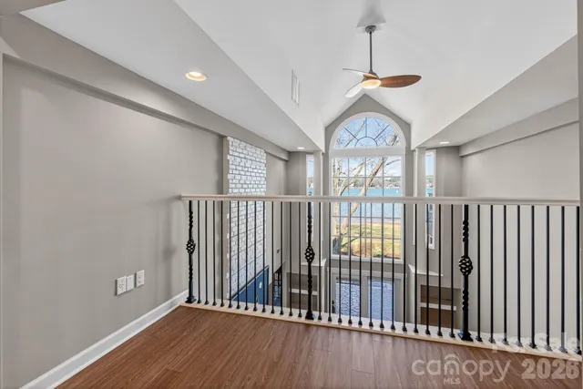 a view of entryway with wooden floor