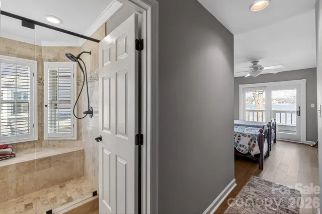 a bathroom with a shower and a tub