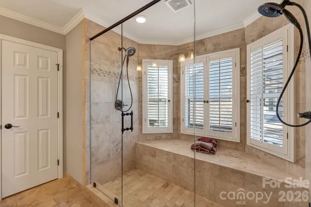 a view of a room with windows