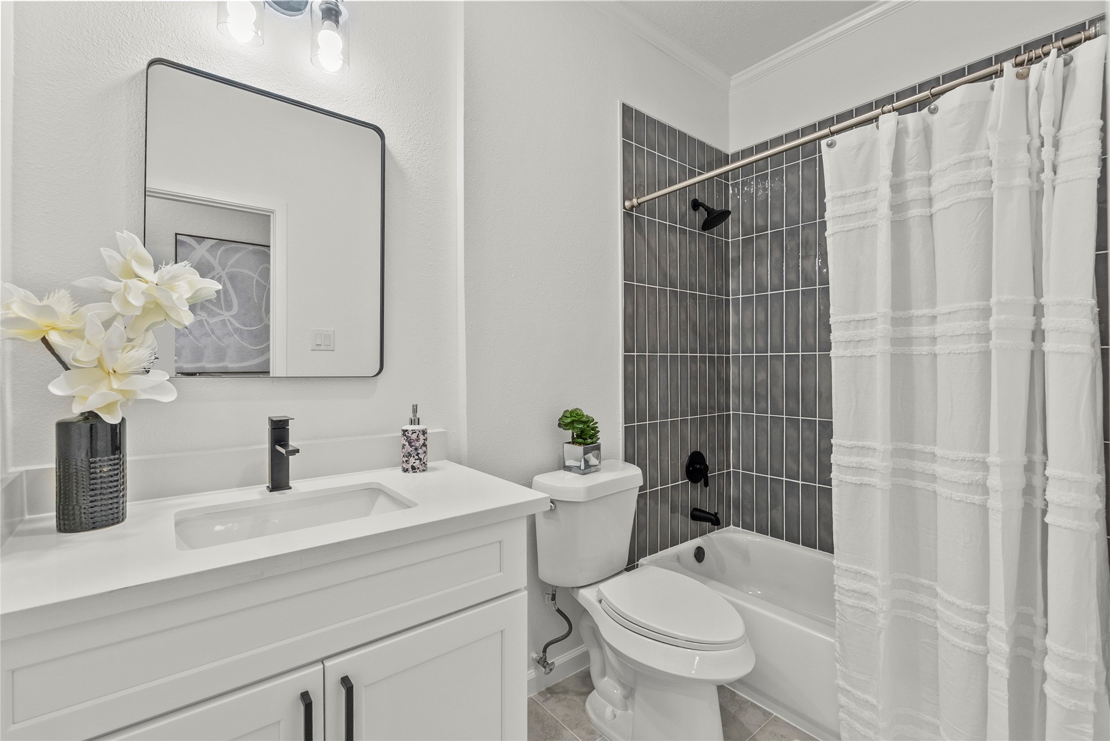 617 Prairie Lane Angleton, TX 77515 - Photo 11 of 14 a bathroom with a sink a toilet and shower