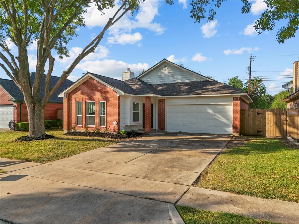 617 Prairie Lane Angleton, TX 77515 - Photo 14 of 14 front view of a house with a yard