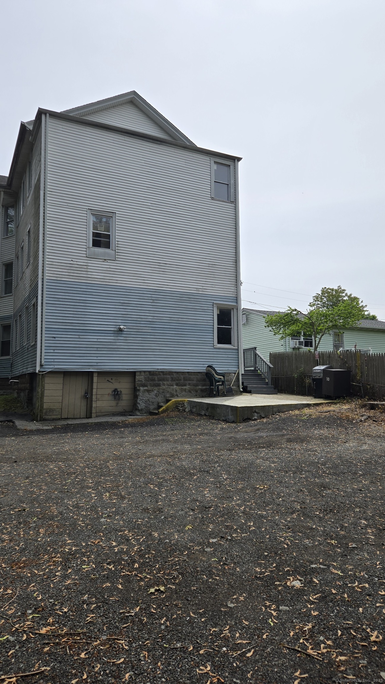 117 Dikeman Street Waterbury, CT 06704 - Photo 17 of 17 a house view with a backyard space