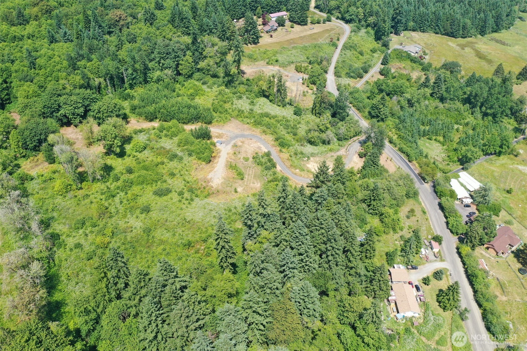 207 Sanderson Road Chehalis, WA 98532 - Photo 14 of 17 a view of a house with a yard and plants