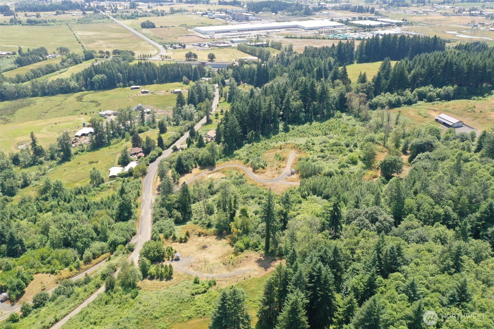 207 Sanderson Road Chehalis, WA 98532 - Photo 15 of 17 a view of a lake with a yard