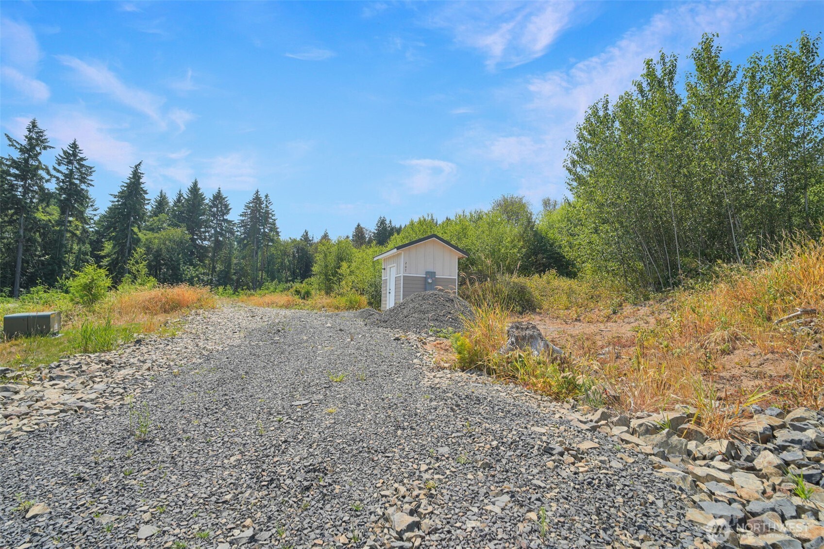 207 Sanderson Road Chehalis, WA 98532 - Photo 6 of 17 a view of a lake with houses in the background