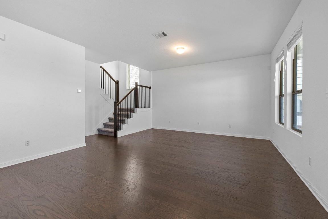 2429 Acoma Lane Leander, TX 78641 - Photo 17 of 39 a view of an empty room with stairs