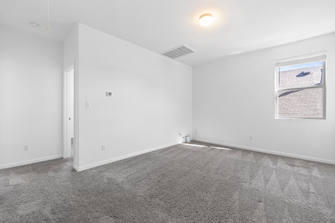 2429 Acoma Lane Leander, TX 78641 - Photo 24 of 39 an empty room with windows