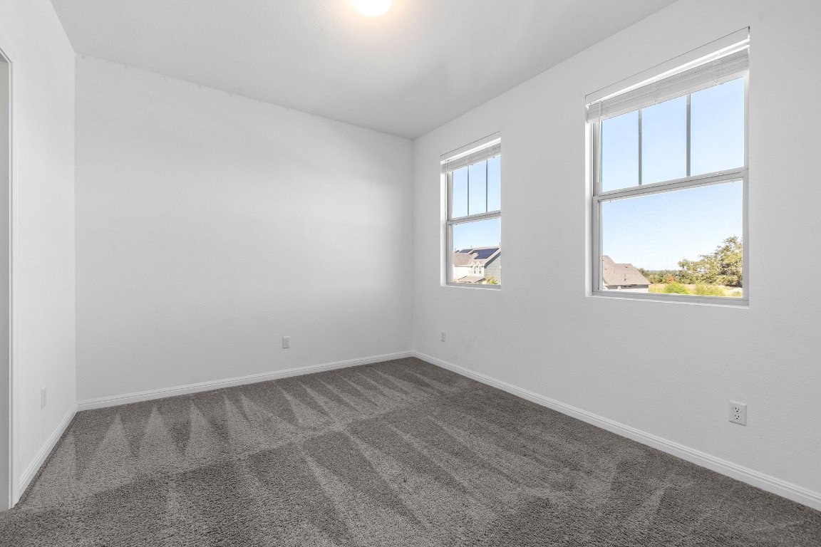 2429 Acoma Lane Leander, TX 78641 - Photo 26 of 39 an empty room with windows