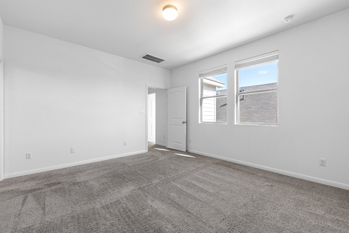 2429 Acoma Lane Leander, TX 78641 - Photo 30 of 39 a view of an empty room with a window