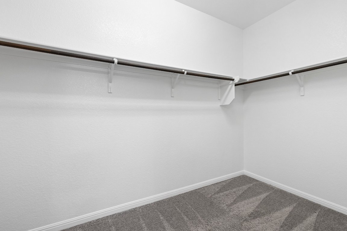 2429 Acoma Lane Leander, TX 78641 - Photo 33 of 39 a view of a room with shelf on the wall