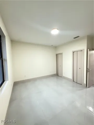 an empty room with a natural light