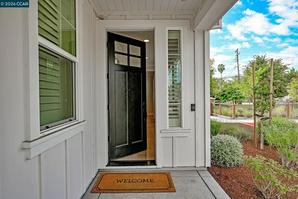 a view of a door and a window