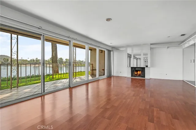 a kitchen with stainless steel appliances a sink and a refrigerator