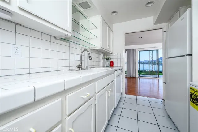 a view of a building with a backyard