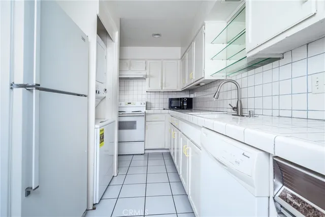 a front view of house with outdoor seating and yard