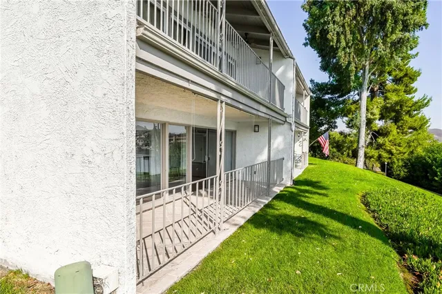 a view of a dining hall with couches and chairs