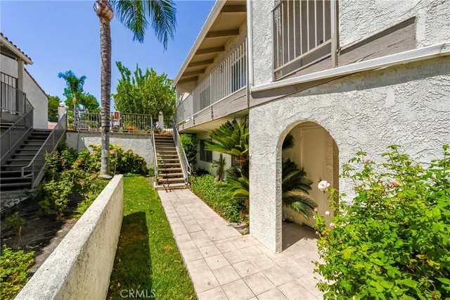 a view of a swimming pool with a garden