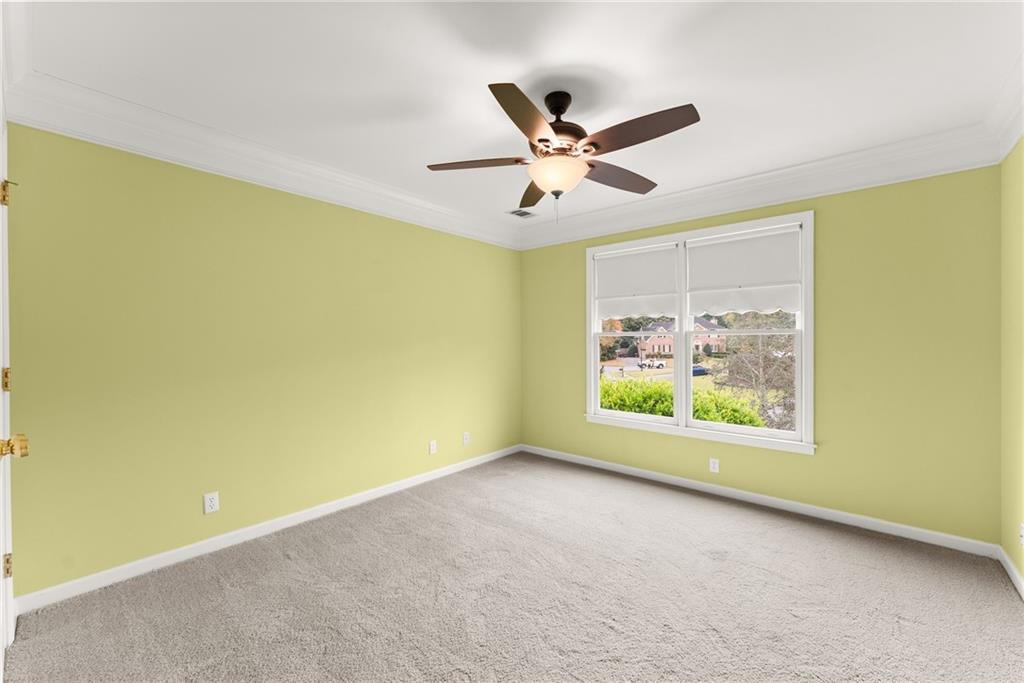 4863 Rosemoore Court Suwanee, GA 30024 - Photo 22 of 74 a view of an empty room with a window
