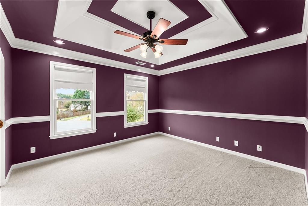 4863 Rosemoore Court Suwanee, GA 30024 - Photo 27 of 74 a view of an empty room with a window