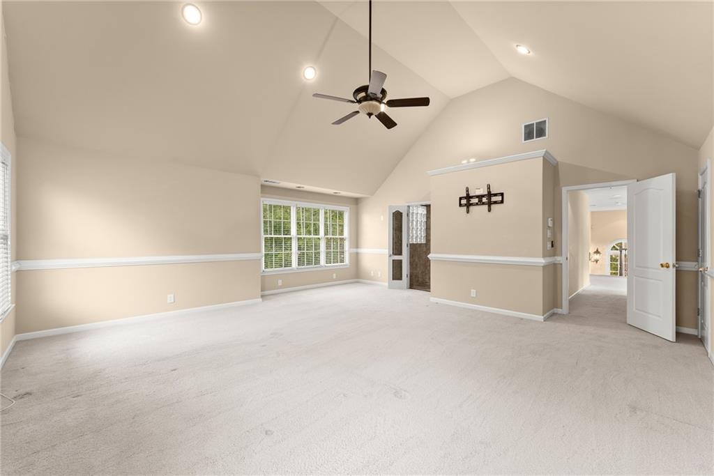 4863 Rosemoore Court Suwanee, GA 30024 - Photo 31 of 74 a view of an empty room with a window