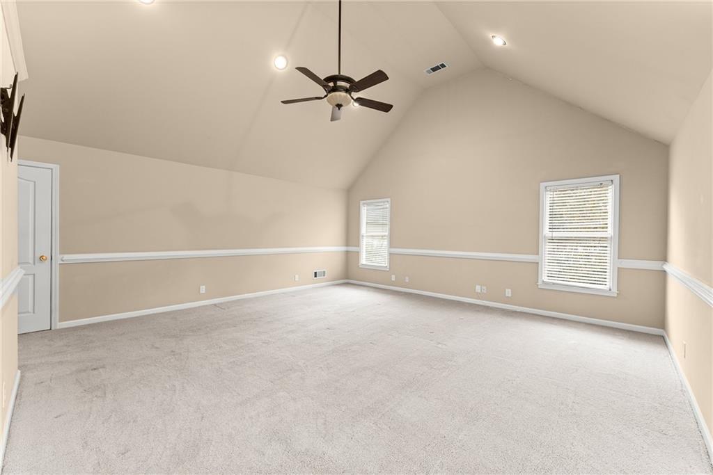 4863 Rosemoore Court Suwanee, GA 30024 - Photo 32 of 74 a view of an empty room with a window