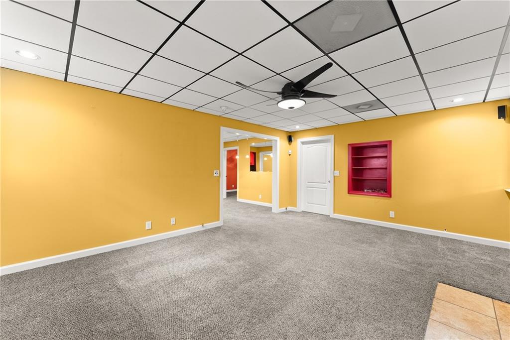4863 Rosemoore Court Suwanee, GA 30024 - Photo 39 of 74 a view of an empty room with a window