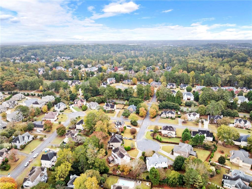 4863 Rosemoore Court Suwanee, GA 30024 - Photo 68 of 74 an aerial view of residential building with green space