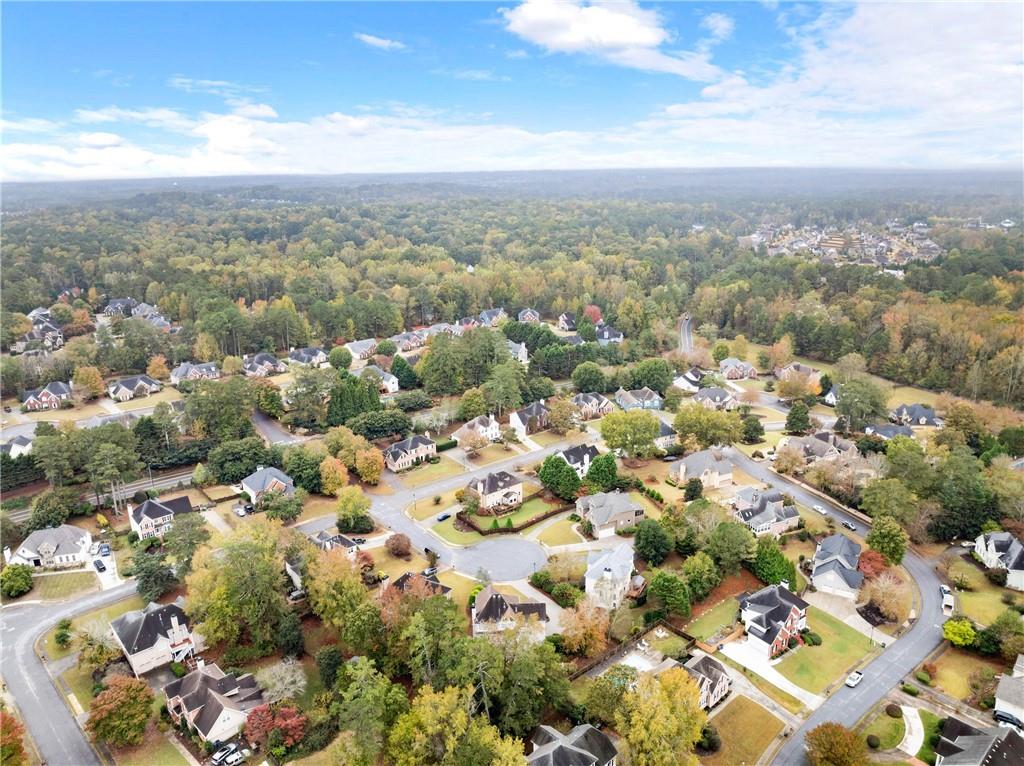4863 Rosemoore Court Suwanee, GA 30024 - Photo 69 of 74 an aerial view of multiple house