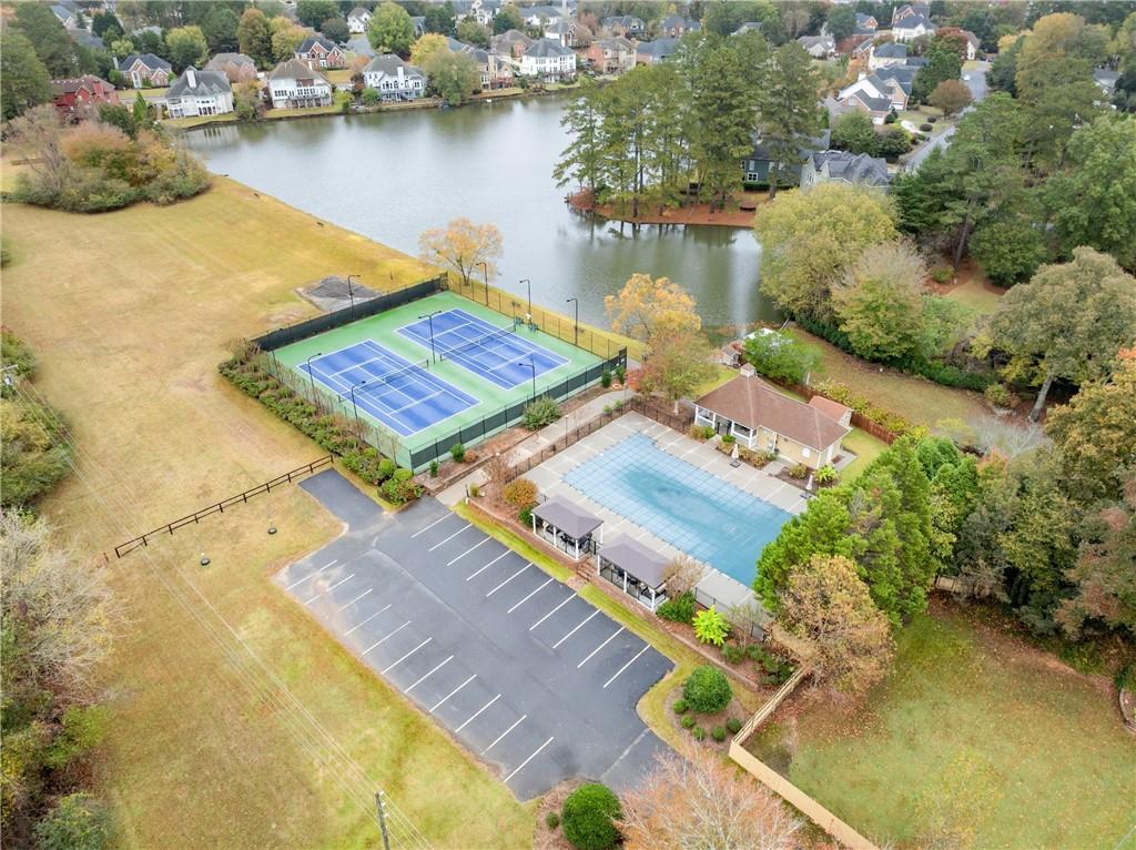4863 Rosemoore Court Suwanee, GA 30024 - Photo 74 of 74 an aerial view of a house with a lake view