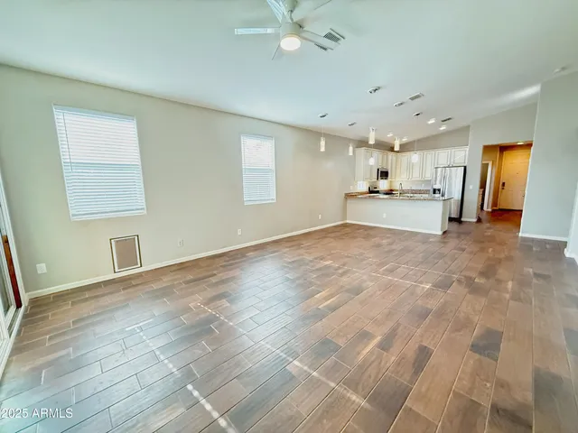 a view of a kitchen with a sink and dishwasher cabinets